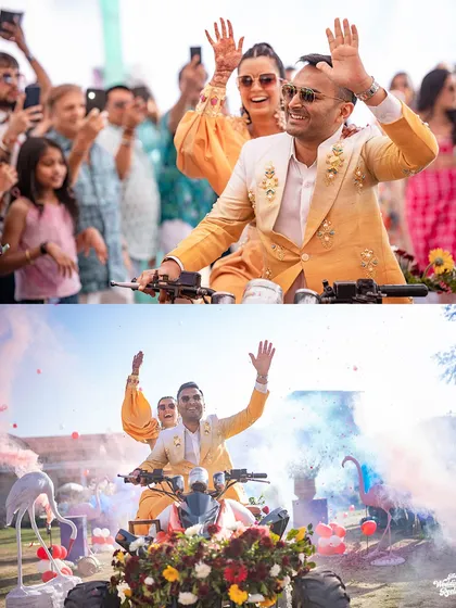 The bride and groom make a stylish and fun entrance on an ATV, surrounded by guests and colorful smoke bombs, kicking off their carnival-themed party.