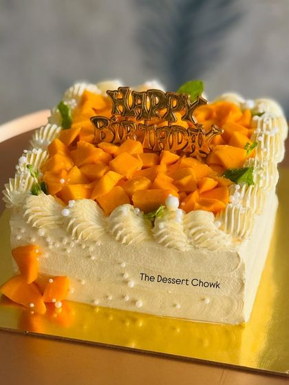 A square version of my Mango Maharaja cake, perfect for a birthday. The square shape offers a modern look for this seasonal favorite.