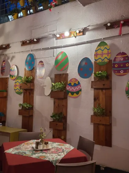 Our wall planters get a festive Easter makeover with colorful egg decorations.