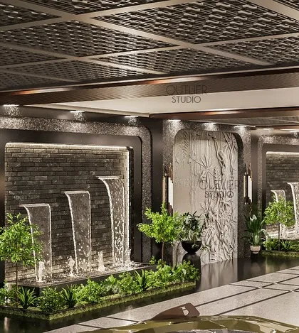 A closer look at the water features in the stilt area. The combination of cascading water, lush planters, and textured walls creates a serene and dynamic environment from the moment you arrive home.