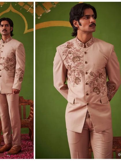 A stunning example of our Nazaakat collection, this blush pink Jodhpuri suit features intricate floral embroidery. It's a perfect choice for a groom looking for a soft yet regal color palette.