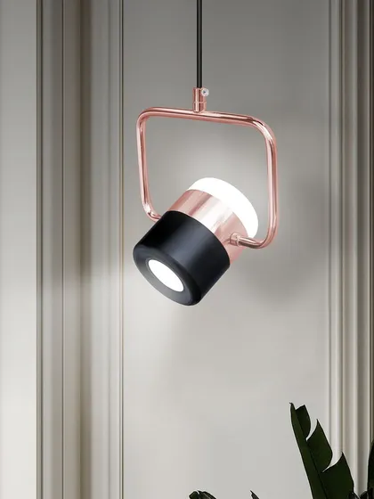Shown against a classic wall moulding, this modern pendant creates a beautiful contrast. Mixing styles can lead to very interesting and personal interior design.