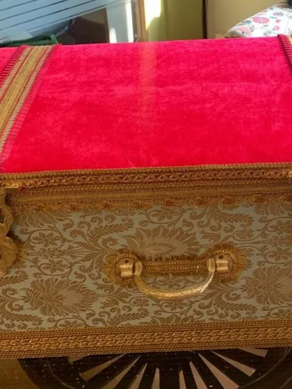 Packaging is part of the gift, and this stunning red velvet 'sanduk' or treasure chest is a testament to that. I use these ornate, reusable trunks to create a truly memorable unboxing experience for wedding and festive gifts.