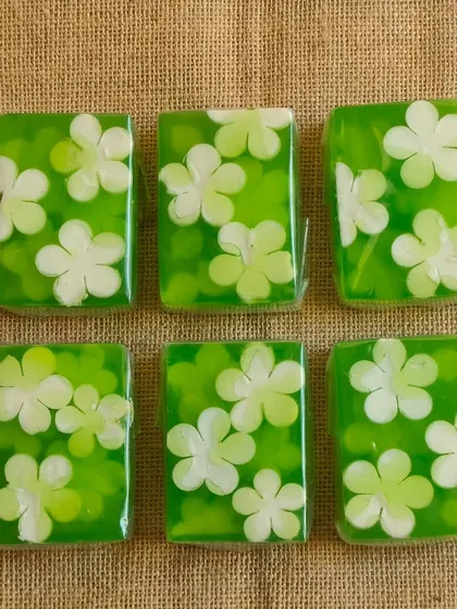 Fresh green and white floral soaps, made with a clear glycerine base.