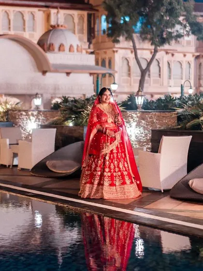 A repeat of the grand poolside bridal portrait, a testament to its cinematic quality and a showcase of destination wedding photography.