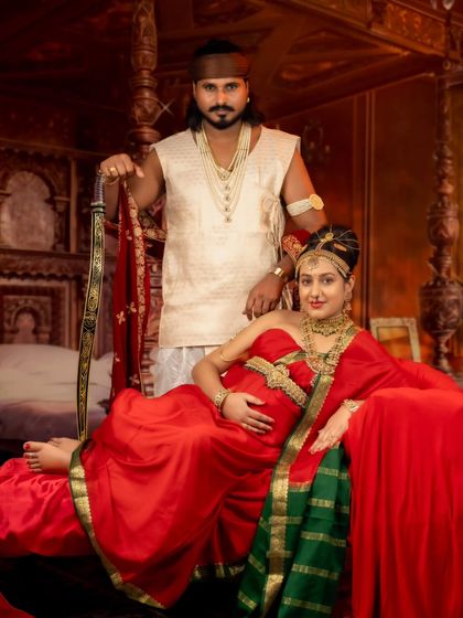 A regal couple's portrait in a palace bedchamber, evoking the grandeur of historical royalty.