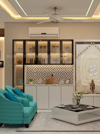 A crockery unit designed next to a stunning pooja unit. The mandir features a backlit "Om" on a marble-finish panel, creating a divine glow.