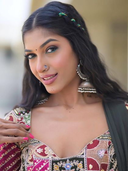 Ditch the black kohl and go green this Navratri! A pop of colored eyeliner is a fun and modern way to add a festive touch to your makeup.