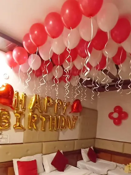 Another shot of the simple and effective red and white birthday balloon setup.