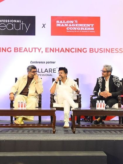 Another shot from the panel discussion at the Salon Management Congress, engaging in conversation about empowering beauty and enhancing business.
