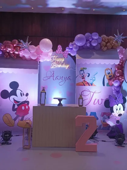 The modern Minnie and Mickey setup under different lighting, showing how the colors pop against the dark background.