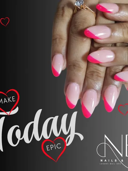 A vibrant, angular French tip in hot pink. This design uses a diagonal color block to create a sharp and modern look on almond-shaped nails.