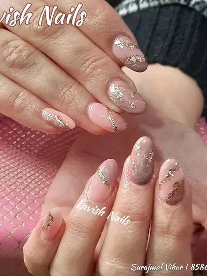 A sophisticated nude and pink set with delicate gold foil flakes and glitter line accents.