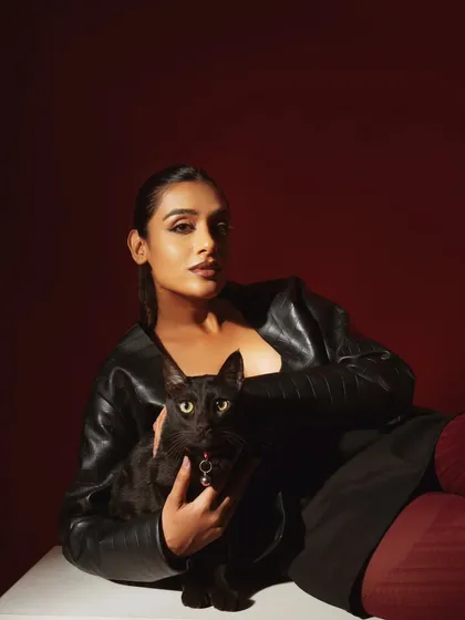 A portrait that combines high-fashion styling with a touch of personality, reflecting my personal value of compassion for all living beings. It shows that a powerful image can also have warmth and soul.