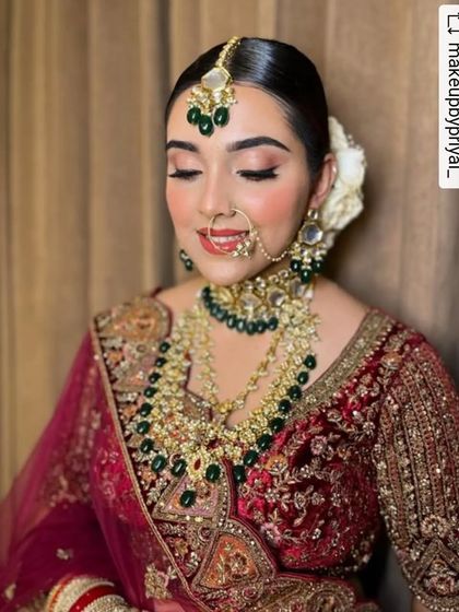A smiling bride is the most beautiful bride. This minimal bridal look focuses on glowing skin and softly blushed cheeks, proving that you don't need heavy makeup to make a statement on your wedding day.