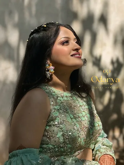 Looking up at the sun, the bride's makeup glows beautifully. I use high-quality products to ensure the makeup looks great in all lighting conditions.