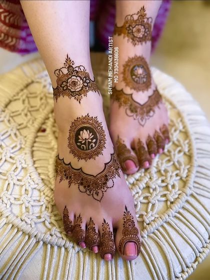 A three-quarter view of the lotus mandala foot design, highlighting the clean lines and precise application.