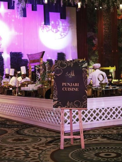 A wide shot of our Punjabi Cuisine station at a large event. While we excel at global fusion, we also honour our roots with authentic, rich, and flavourful traditional Indian food counters.