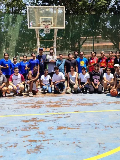 It's all about bringing people together through sports. This is a great shot from an Inter-Parish basketball tournament I helped organize and played in, showing the large-scale community and corporate events I can put together.