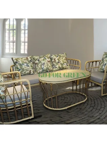 This complete rattan-style lounge set includes a sofa, two armchairs, and an oval coffee table. The light, airy design and jungle-print cushions bring a touch of bohemian elegance, perfect for both indoor and semi-outdoor spaces.