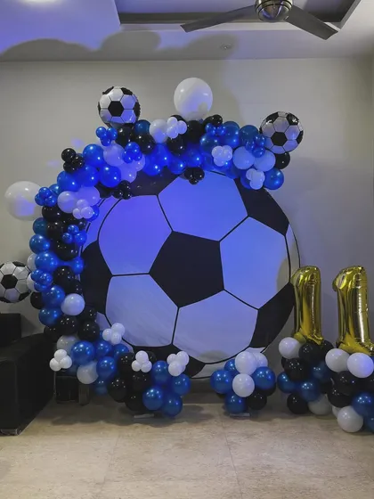 The full view of the impressive football-themed birthday decor.