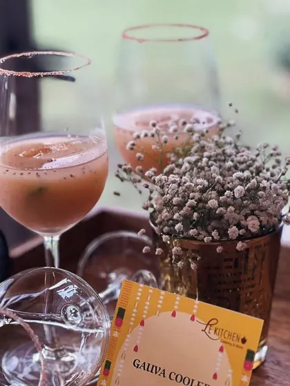 The Gauva Cooler is a tropical and delightful drink. Served in a wine glass with a spiced rim, it's a perfect balance of sweet and tangy flavors.