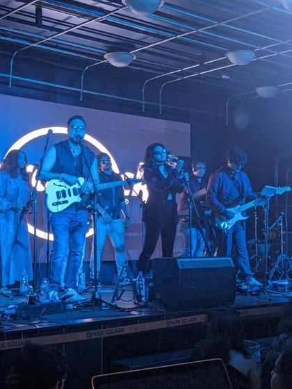 A full stage view of our performance at Hard Rock Cafe. This image showcases the entire band and the professional stage setup we bring to every gig.