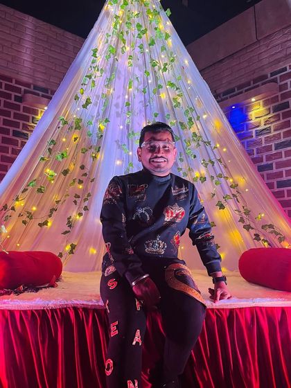 Just me, enjoying the calm before the storm. Taking a moment to sit on the decorated stage and get my energy right is an important part of my pre show ritual.