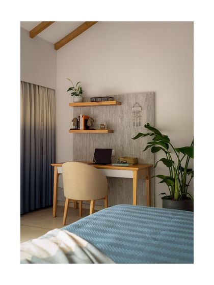 A well-designed workstation, like this one with its soft-upholstered chair and ample natural light, can transform daily tasks into moments of inspiration. We blend ergonomic comfort with visual appeal to support long hours of productivity.