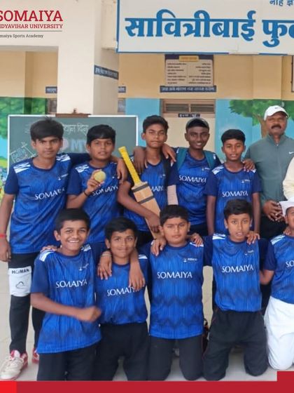 The victorious U-14 Boys team from Somaiya Vidya Mandir Laxmiwadi poses with their coaches after clinching the district-level tennis cricket title.