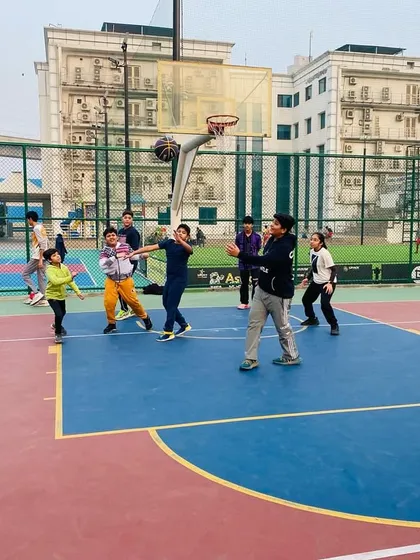 A player takes a shot during an evening session.
