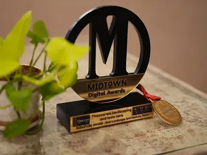 A close-up of the Midtown Digital Award for "Best Landscape Architecture," a symbol of our dedication to excellence in design.