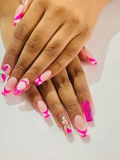 The full Barbie nail set, complete with a portrait, the Barbie logo, and fun pink swirls.