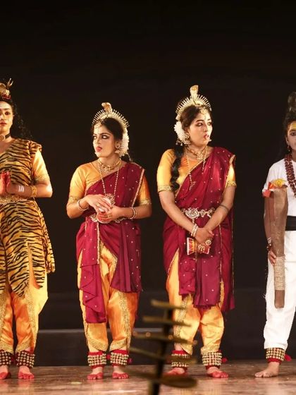 Our dancers portraying different characters in the story of Daksha Yaga. The varied costumes, from the tiger-striped attire to the simple white of a rishi, help define each character's role in the divine drama.