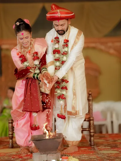 Documenting sacred rituals is a core part of my wedding coverage. Here, the couple participates in the fire ceremony, a moment I capture with respect and an eye for its profound beauty.