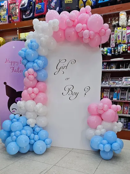 Build the excitement for your gender reveal party with a dedicated "Girl or Boy?" backdrop. This clean and simple design uses an organic balloon arch in classic pink, blue, and white to perfectly frame the big moment.
