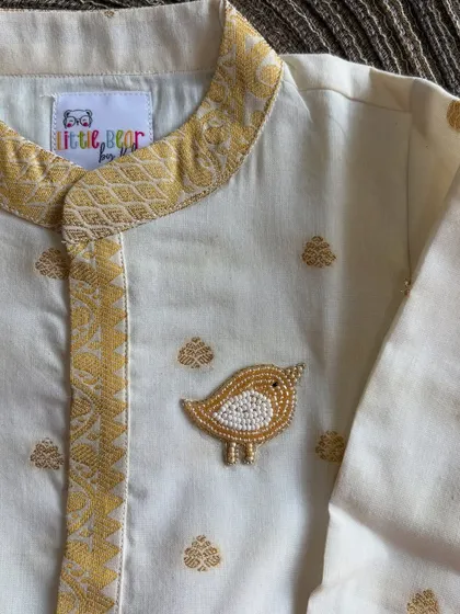 It’s the little things that matter most. I love adding special handmade touches, like this sweet little bird brooch, to my outfits. It’s my way of adding a little extra love and character to each piece I create for your child.