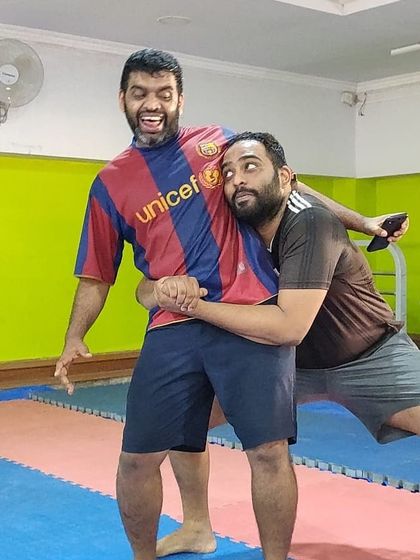 We keep the vibe light and fun, even when drilling serious techniques. Here we are practicing a side body lock, a powerful takedown in wrestling and MMA.