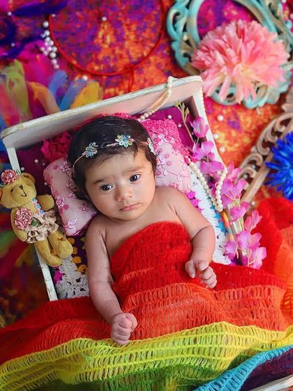 Even the tiniest babies can celebrate Holi! This newborn is wrapped in a rainbow of colours, creating a safe and beautiful way to mark their first festival of colours.