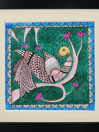 This Madhubani painting by Vrishti showcases a bird perched on a branch with pink flowers. The artist uses intricate cross-hatching and patterns to fill the space, creating a rich and textured look.
