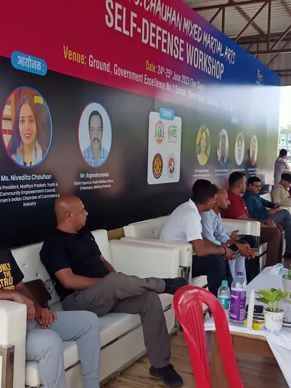 Our coaches sitting on the panel during the two-day MMA for Self-Defense workshop, recognized by AIMMAA.