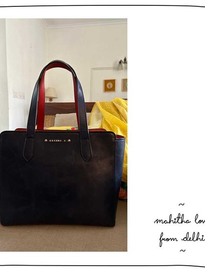 Our patron Reshma from Delhi with her Mahitha tote in Indus Rose. The pop of red on the inside and the custom monogram make this classic black work tote extra special.