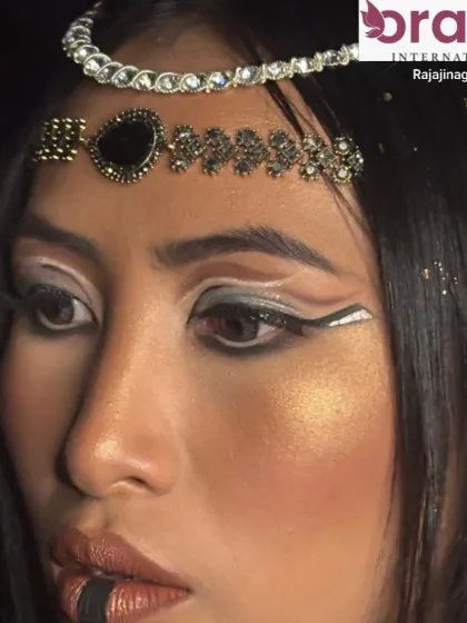 A close-up on the unique graphic eyeliner, a key element of the Cleopatra makeup style.