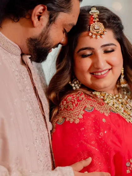 A collection of moments from this bride's reception. Her look was all about soft glam, with flowing waves and makeup that highlighted her joyful smile, creating a perfect look for her evening celebration.