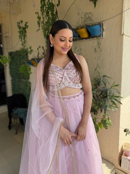 The bride looking serene and beautiful in her soft glam makeup. This look is perfect for an engagement or Sangeet.