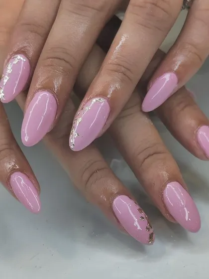 A soft pink manicure with silver foil accents for a subtle touch of metallic texture.