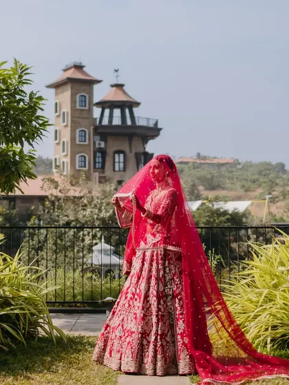 A fairytale moment for the bride. The stunning venue and her beautiful lehenga are perfectly complemented by my timeless bridal makeup.