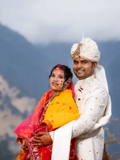A portrait of the newlyweds with the majestic Garhwal Himalayas in the background. This is the essence of a divine destination wedding.