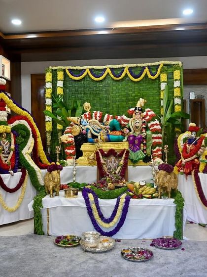 The entire pooja setup, a beautiful display of devotion and tradition. Our saree plays a special role in honoring the Goddess.