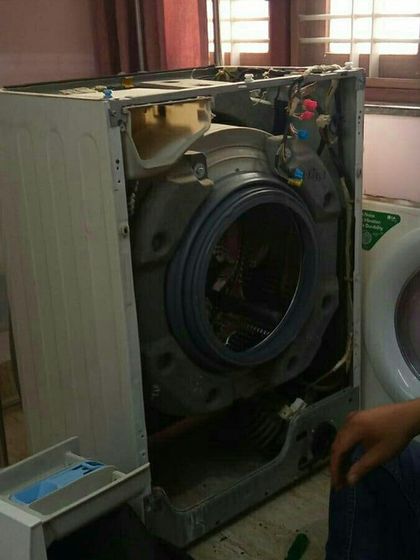 We also help connect people with local repair professionals. Here, a 13-year-old LG washing machine is being serviced, extending its life and saving it from the landfill.